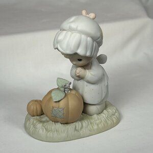 Precious Moments. October little girl figurine
